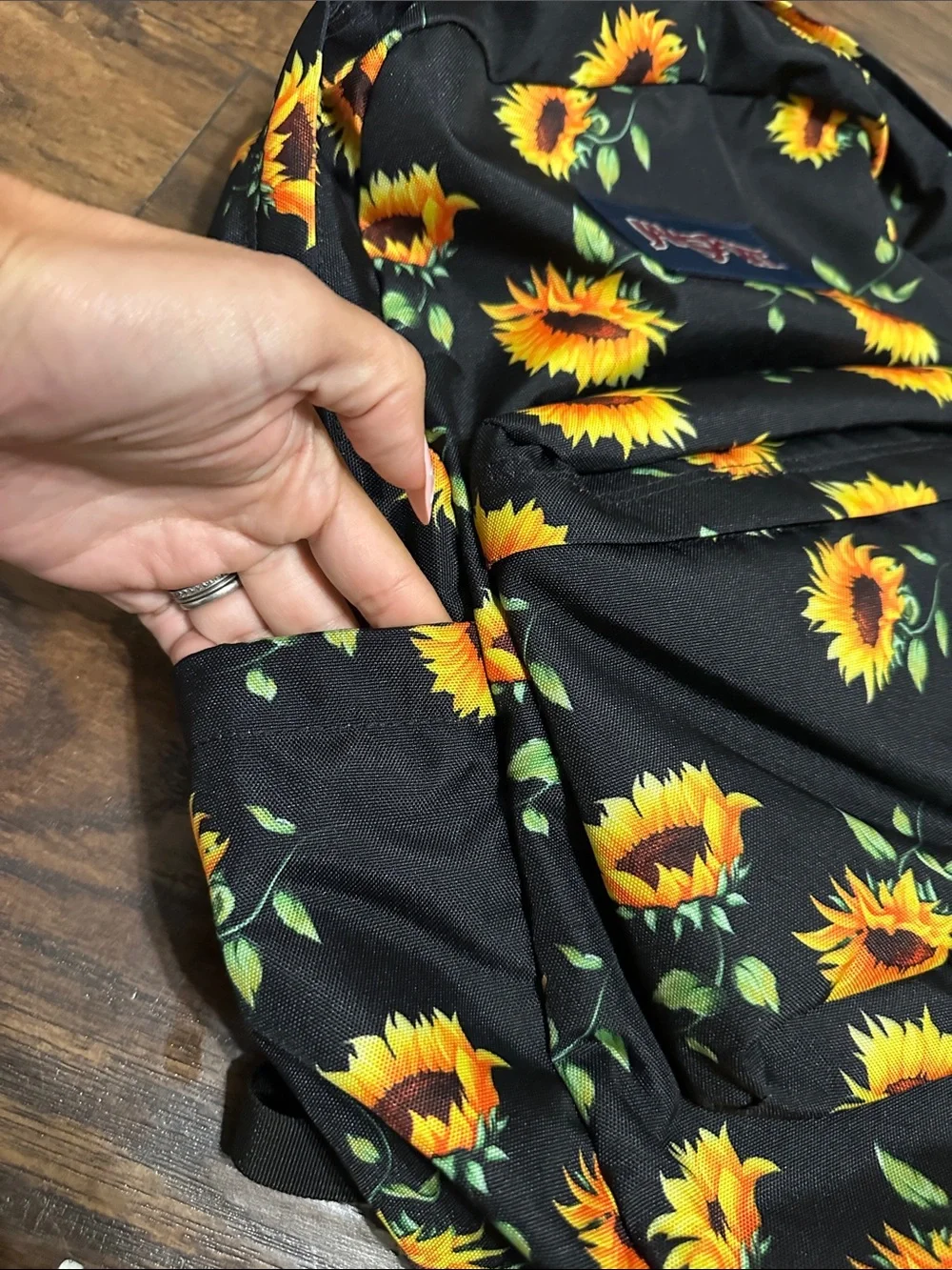 Jansport Black Backpack with Yellow Sunflower Print